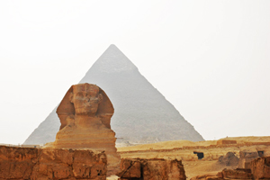 The Sphinx with Pyramid in the background.